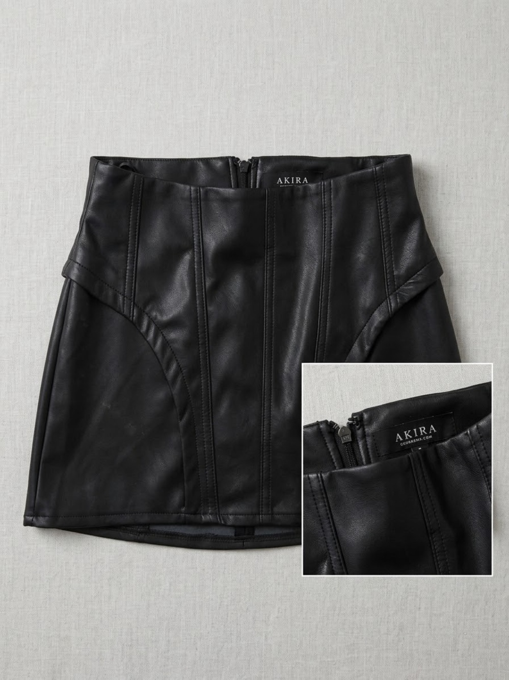 AKIRA Black Faux Leather Mini Skirt with Curved Paneling